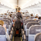 Image for article titled Sleeping Airline Passenger Misses Out On Aisle-Wide Bacchanalia Of Peanuts, Decaf Coffee
